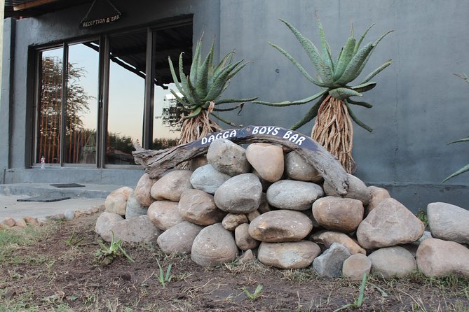 3 Day Lodge/Masango Kruger National Park Safari - Evening shift at Masango Camp: chalets, waterhole views, and night-time ambiance