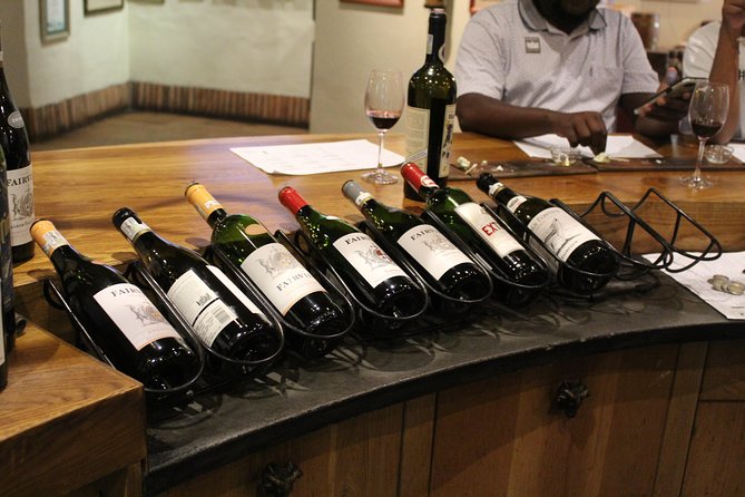 A Visit To Stellenbosch Franschoek Paarl Wineries From Cape Town Full Day - Peter Falke Winery: Signature Labels, Hills for Backdrops, and Outdoor Snacking
