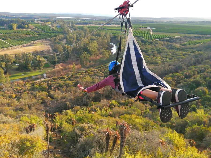 Adrenalin Addo Adventure Park: Superman Zipline - The run-up to the tower: raft crossing, indigenous bush, and some uphill effort