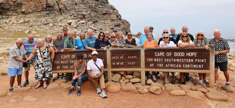 Cape Peninsula & Penguins Beach Half Day Tour from Cape Town - Passing Muizenberg on the return: the easy finale