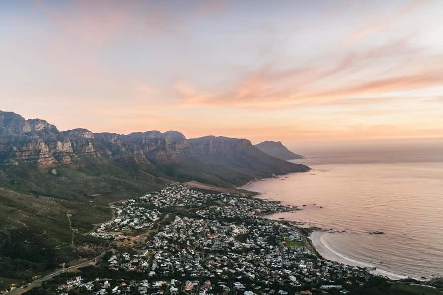Cape Town: Guided Lion's Head Hike at Sunrise or Sunset - The climb: rocky paths, short scrambles, and the chains and ladder choice