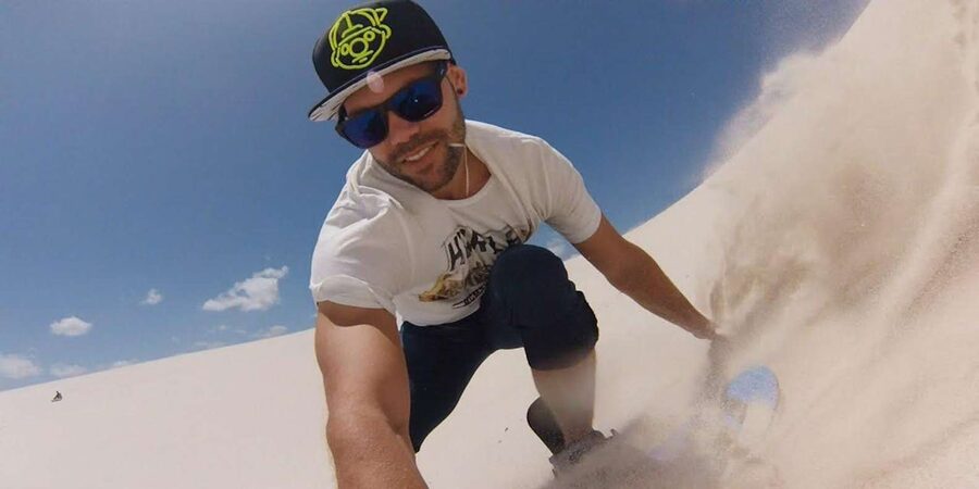 Cape Town: Guided Sand Boarding Experience at Atlantis Dunes - Climbing to the top: where the Table Mountain backdrop makes it worth it