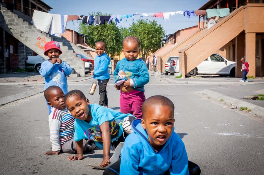Cape Town: Guided Township Tour with Hotel Pickup - V&A Waterfront lunch break and the ferry timing game