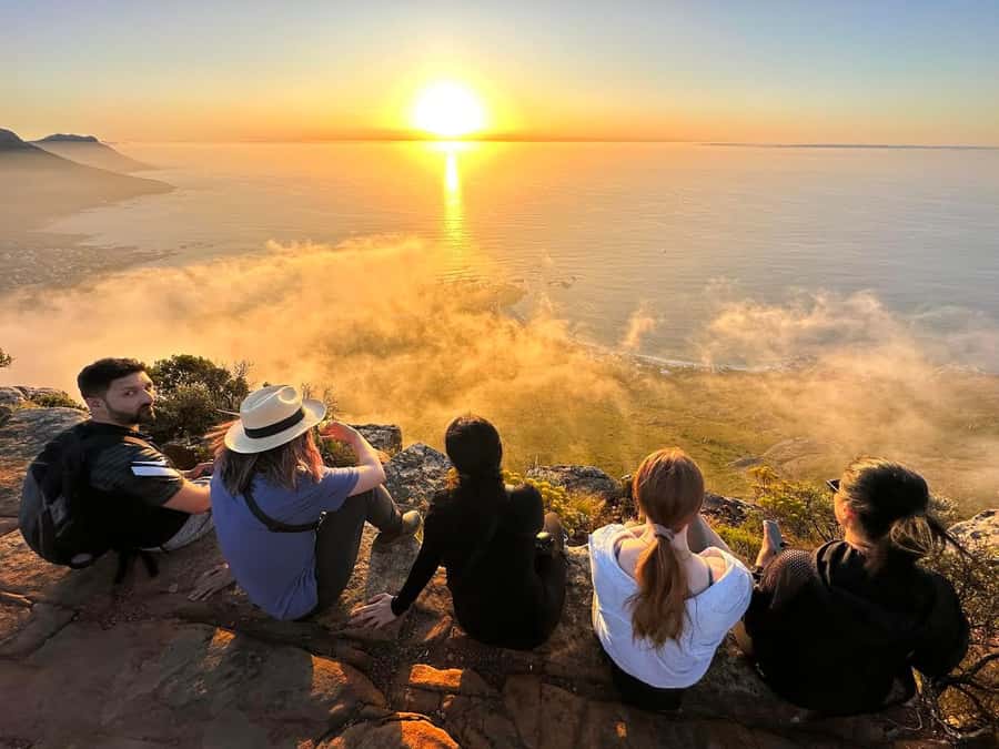 Cape Town: Lion's Head Sunrise or Sunset Hike - Sunrise hike: headlights, dark steps, and golden light
