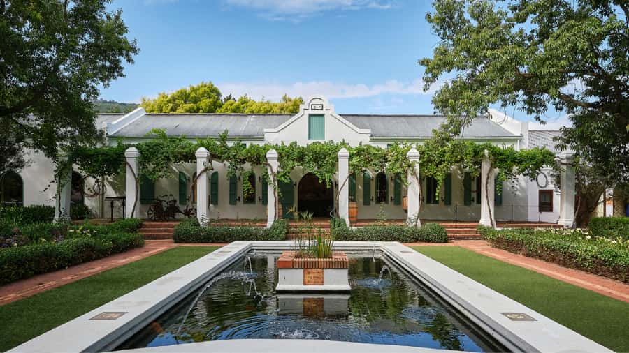 Cape Town: Stellenbosch, Franschhoek and Paarl Wine Day Trip - The Finale: MCC and Macarons With Franschhoek Mountain Views