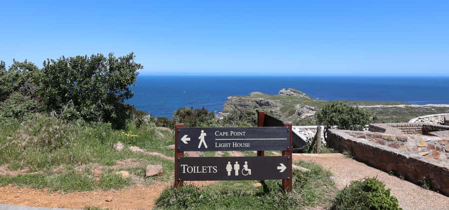 Cape Town: Tour Cape Point & Boulders Beach Penguin Day Trip - Muizenberg beach huts and the shark spotters story