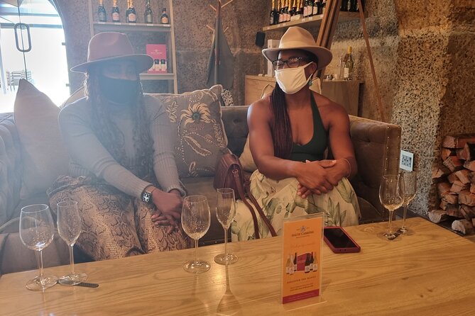 Cape Town Wine Tour & Tasting all inclusive - Tokara Wine Estate: Simonsberg slopes, olive groves, and False Bay to Table Mountain views