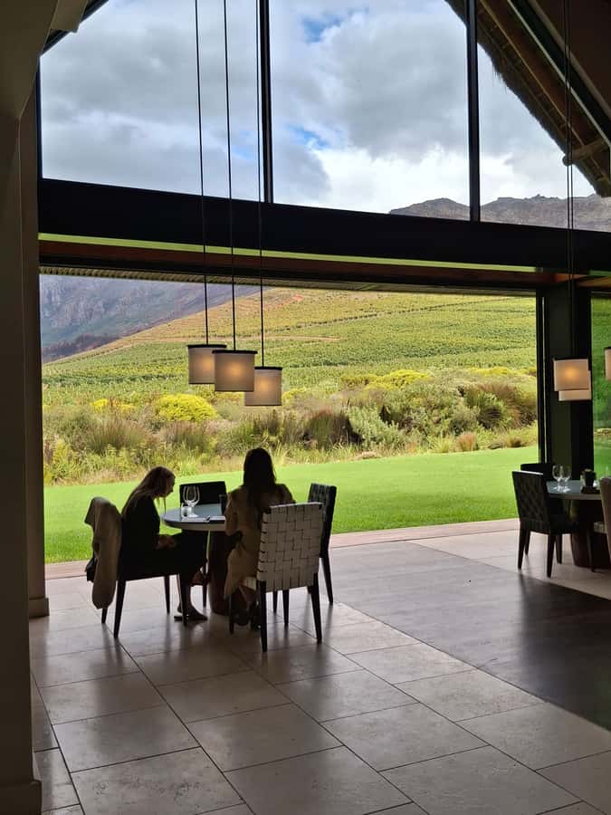 CUSTOMISED PRIVATE WINE TOUR WITH LUNCH - CAPE TOWN - Delheim Wine Estate: Sustainable Farming and Scenic Photo Moments