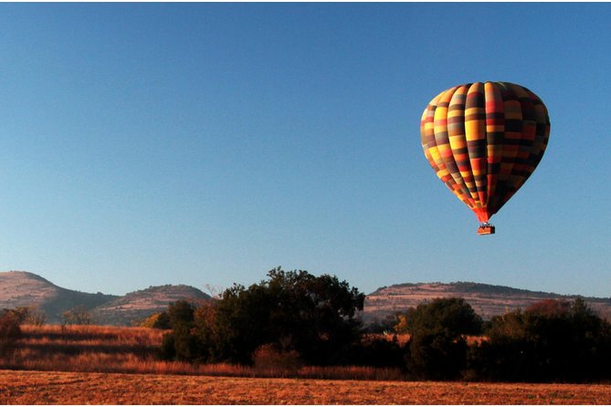 Early Morning Balloon Safari with Breakfast from Magaliesburg - Landing, sparkling wine toast, and that included breakfast