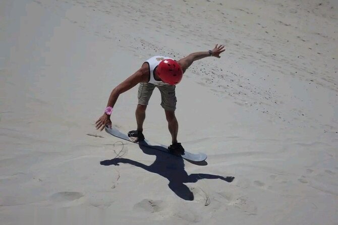 Explore Atlantis Sand Dunes with a 1hour 30mins sandboarding tour - Price Breakdown: What $17.08 Covers and What Costs Extra