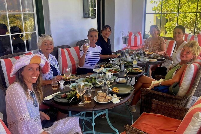 Franschhoek Wine Walk with Lunch - La Roche vineyards: protea fields, orchards, and another tasting window
