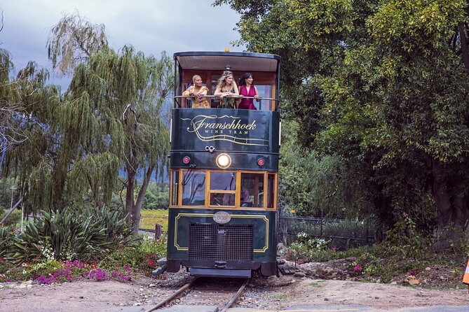 From Cape Town: Franschhoek Wine Tram Hop-on-Hop-off Tour - Wine tasting at the estates, plus how to budget without stress
