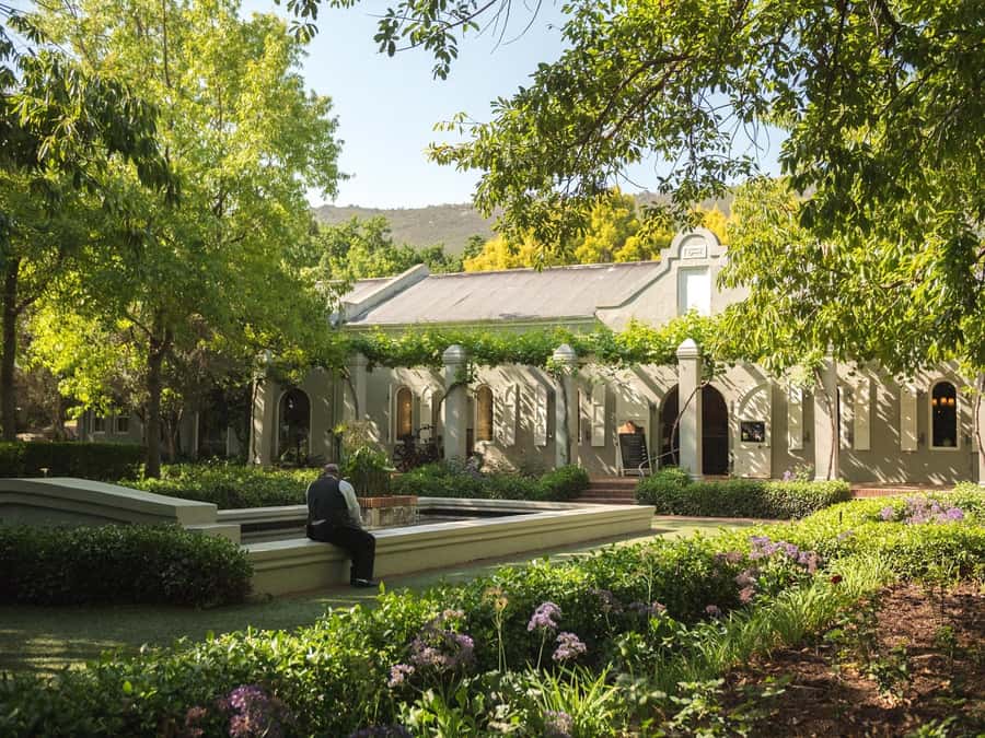 From Cape Town: Stellenbosch Four Estate Full-Day Wine Tour - Lunch in the Winelands, planned into the flow