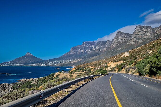 Full Day Private Cape Peninsula and Boulders Beach Tour - Muizenberg and Noordhoek: quick coastal flavor while you travel