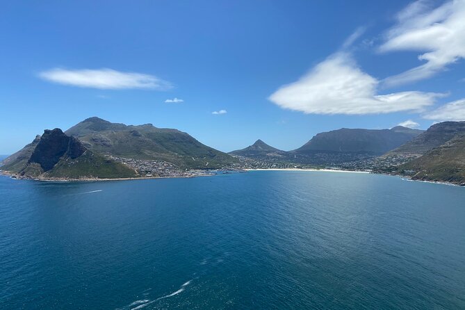 Full Day Private Cape Peninsula and Boulders Beach Tour - Hout Bay and the Seal Island boat component: sea air before the cliffs