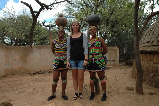 Hluhluwe Imfolozi & DumaZulu Cultural Village Tour from Durban - Guide quality and the ride between stops