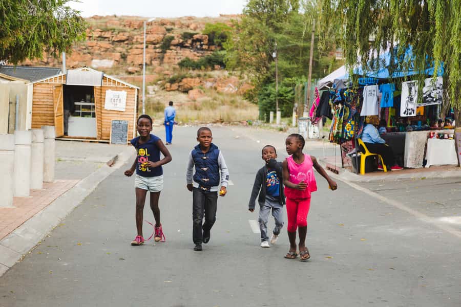 Johannesburg and Soweto Apartheid Full Day Tour w/Lunch - Soweto essentials: Vilakazi Street, cooling towers, and the bigger picture