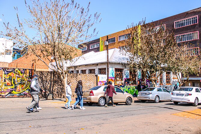 Johannesburg: Downtown Walking Tour Including Ponte City building - Maboneng and Jewel City energy, street art, and everyday culture