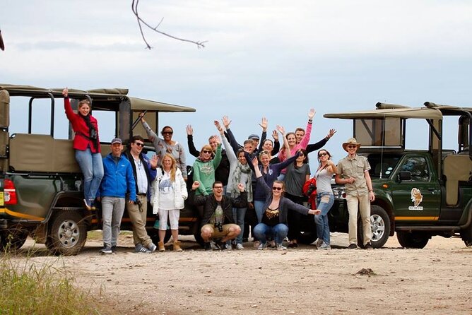 Kruger National Park sunrise Morning Private safari - Open safari vehicle and guide focus, including Abraham N and Patrick