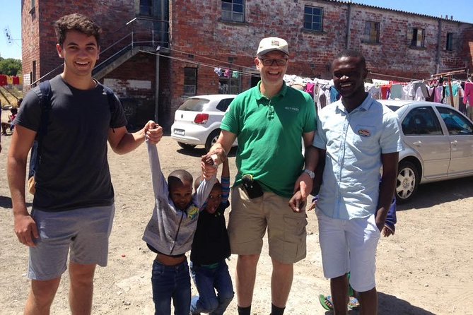 Langa Township and Bokaap Cooking Class Half Day Tour - Stop 1: Langa Township walking tour, local guide welcome, and the craft market option