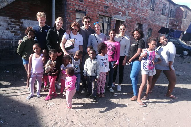 Langa Township Half Day Tour - Langa Township street art and mural meaning, explained in plain language