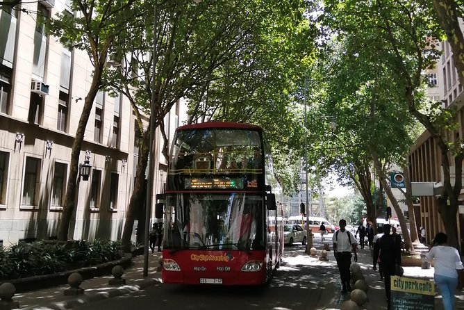 LocalPlaces Understanding Johannesburg Walking Tour - Main Street in the middle: modern Johannesburg beside older clues