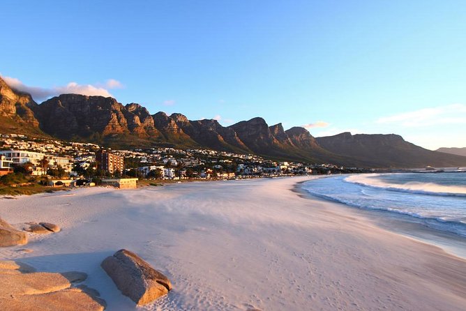 Private Cape Peninsula + Kirstenbosch Garden Full Day Guided Tour - Hout Bay harbour and Chapmans Peak: the coast slows down