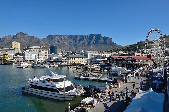 Private tour to Robben Island Kirstenbosch and Constantia Winery - V&A Waterfront: use the hour for food, shopping, and a breather