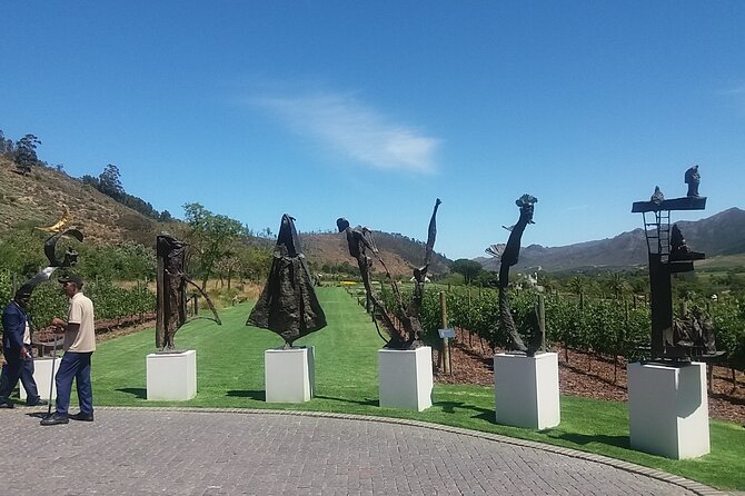 Private Tour To Stellenbosch Franschoek Wineries from Cape Town Price Per Group - Franschhoek’s Main Road, Galleries, and the Huguenot Memorial