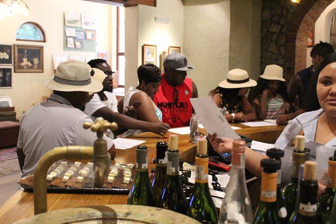 Private Tour To Stellenbosch Franschoek Wineries from Cape Town Price Per Group - Fairview Wine and Cheese at Paarl Rock Footing