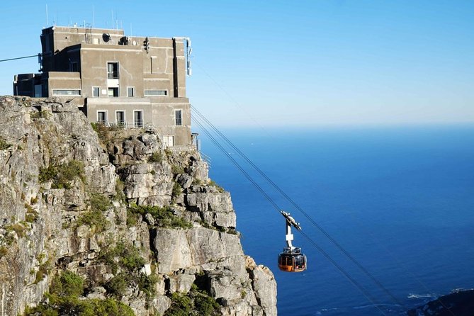 Robben Island with Tickets & Iconic Table Mountain Full Day Tour - Robben Island Museum: touring with the person who lived it