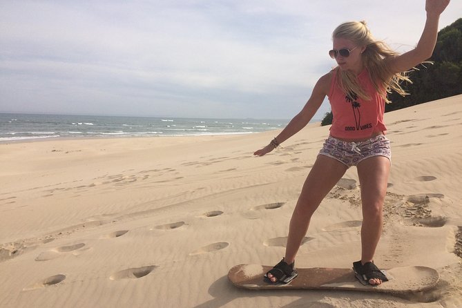 Sandboarding in Jeffreys Bay, South Africa - Standing and sitting boards: the learning curve is part of the fun