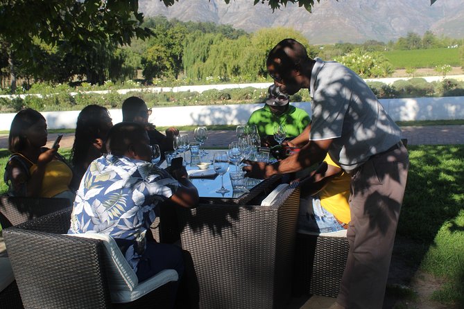 Shared Tour To The Wineries Stellenbosch Paarl + Cheese Tasting from Cape Town - The guide makes the day feel smooth, not staged