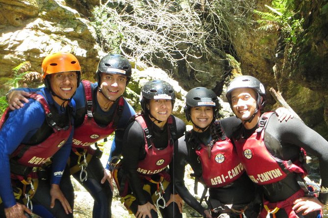 Short Canyoning Trip in The Crags - River confluence choices: cliffs, jumps, and the waterfall abseil setup