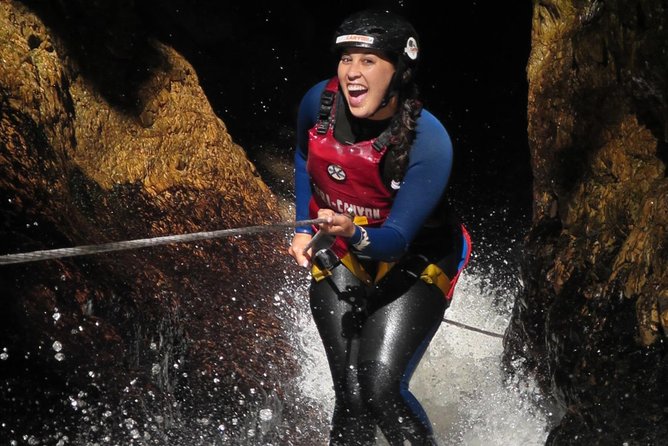 Short Canyoning Trip in The Crags - The Rush waterfall: the 25-meter abseil moment that sells the whole trip