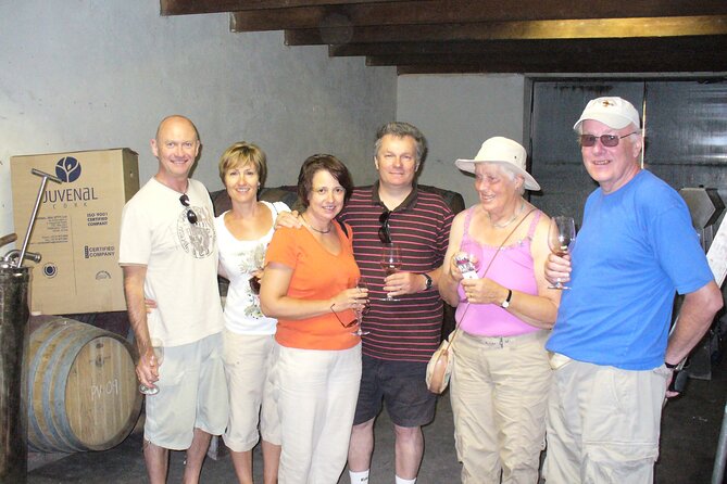 Small Group Daily Wine Tour - Stop 1 at Thelema Mountain Vineyards: a mountain pass and porch seating