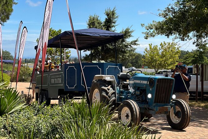 Stellenbosch Wine Tractor hop-on-hop off wine tasting tour - Families and group energy: small cap, mixed crowds, smart rules
