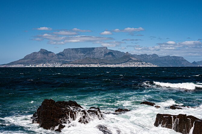 Table Mountain & Mandela Freedom Full Day Tour - Robben Island first, then downtime: why the V&A Waterfront stop is useful