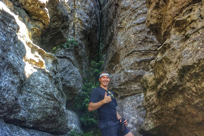 Table Mountain: Tranquility Cracks Full Day Hike - The overhanging rock photo moment, and how guides make it safer